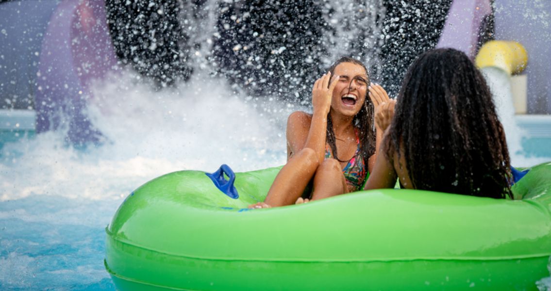 Couple getting splashed